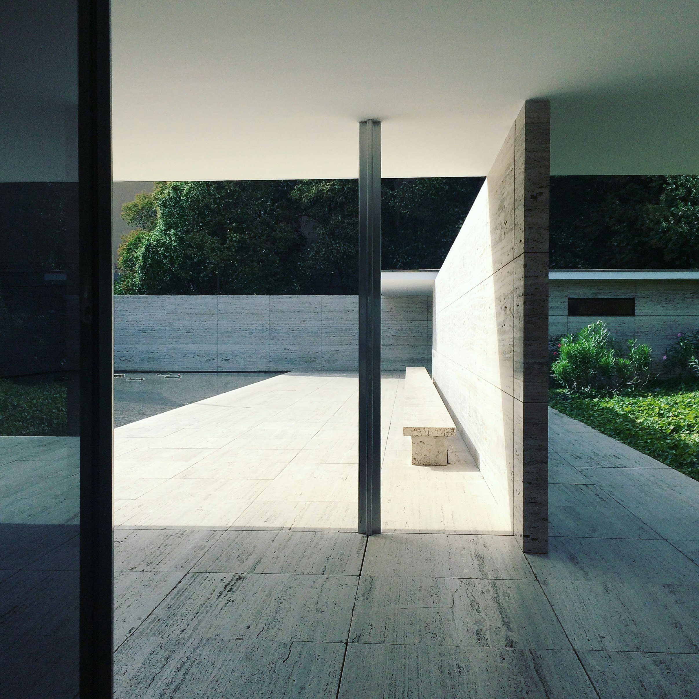 brown concrete building near body of water during daytime